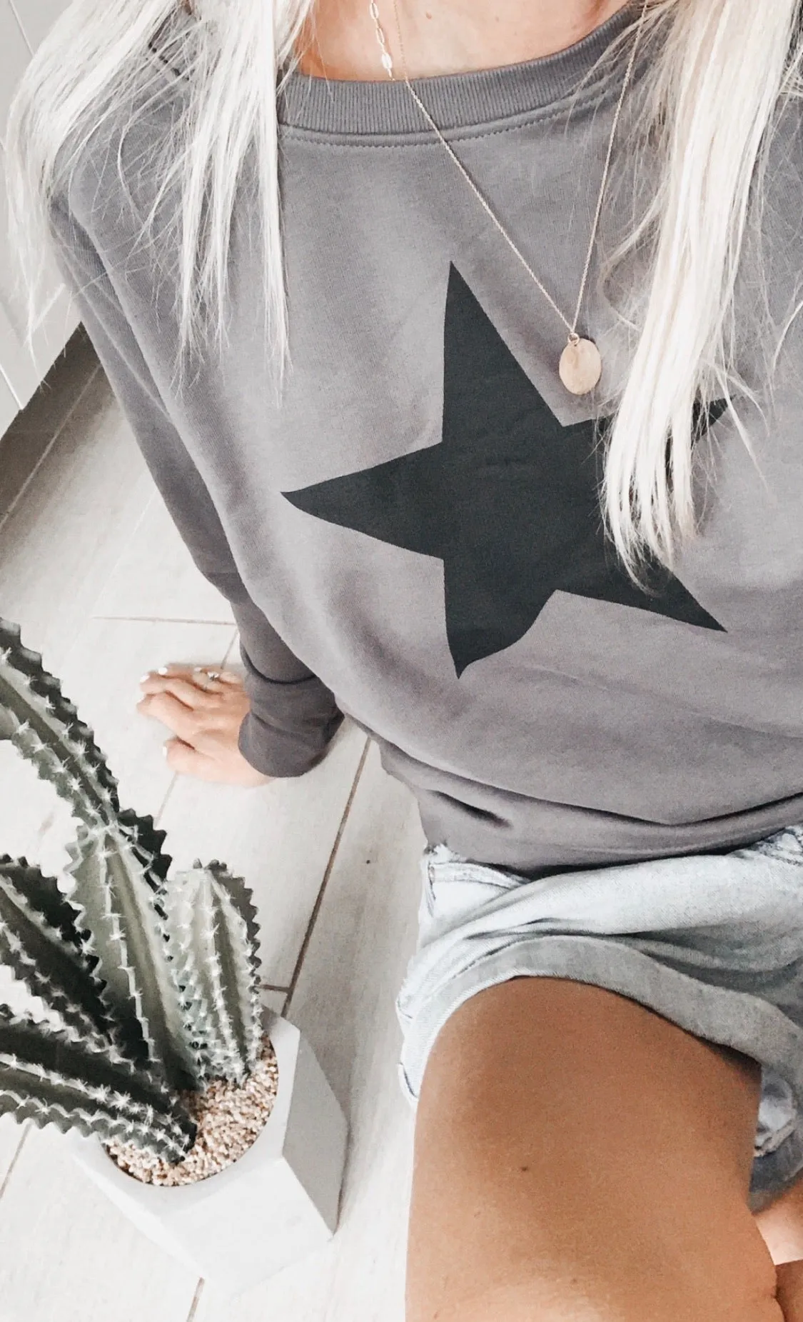 Black star on charcoal sweatshirt *new*